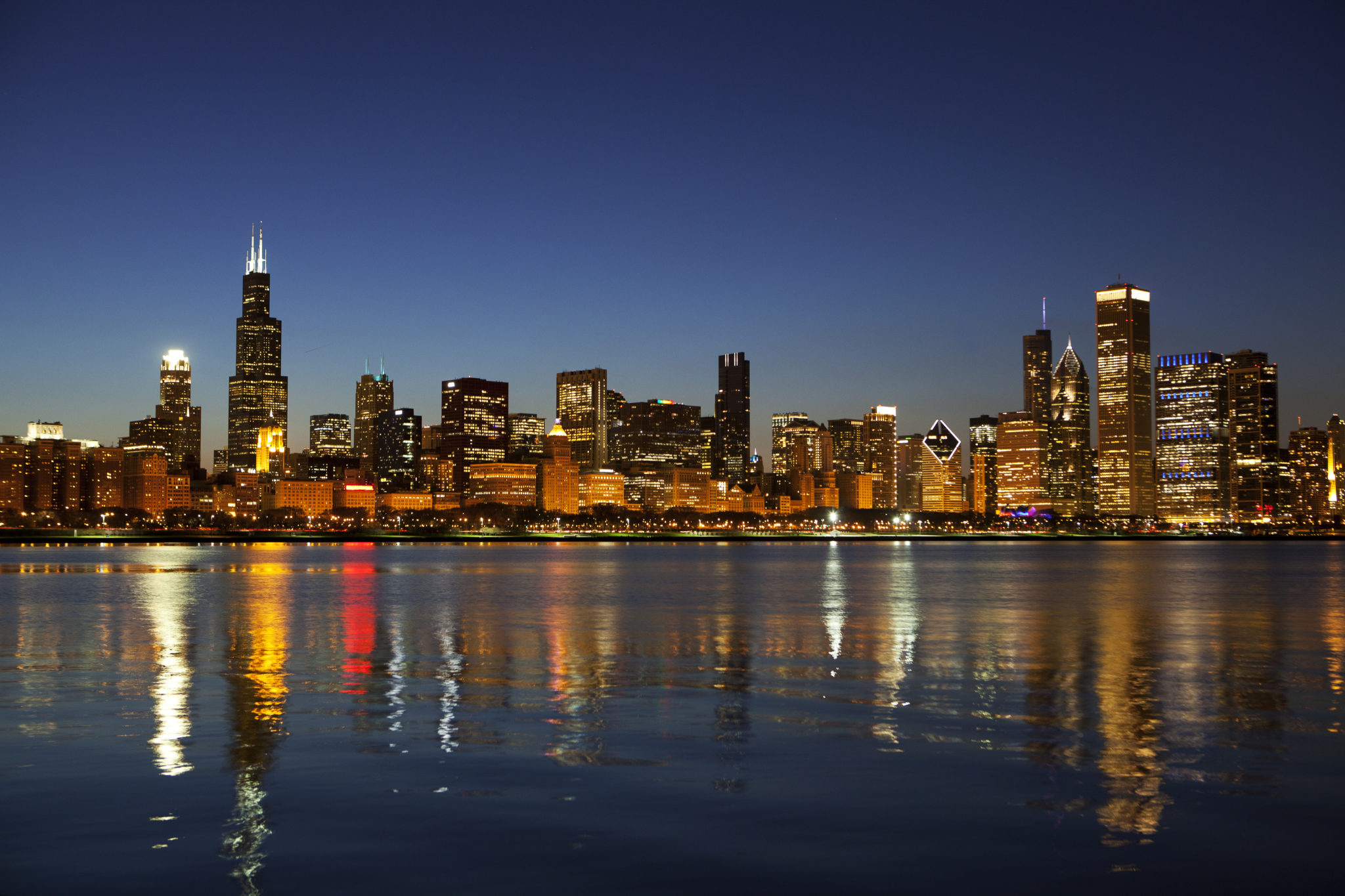 Chicago at dusk image via Shutterstock.