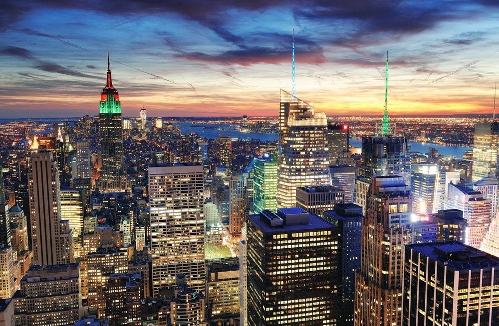New York City skyline image via Shutterstock.