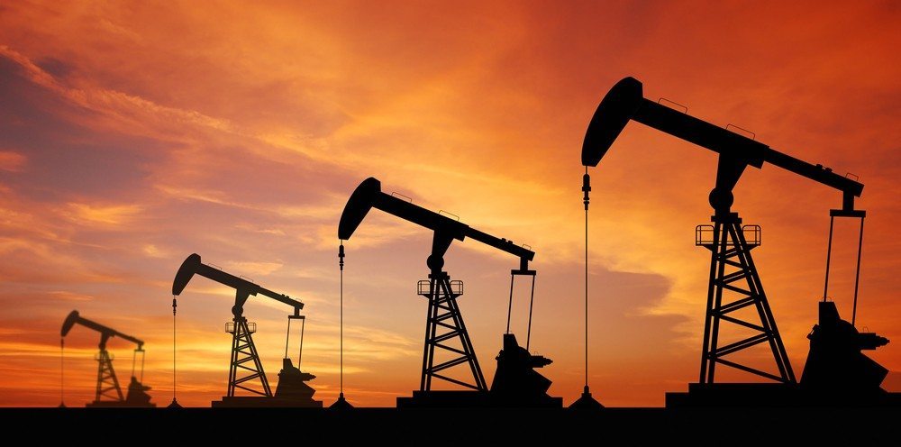 Oil wells image via Shutterstock.