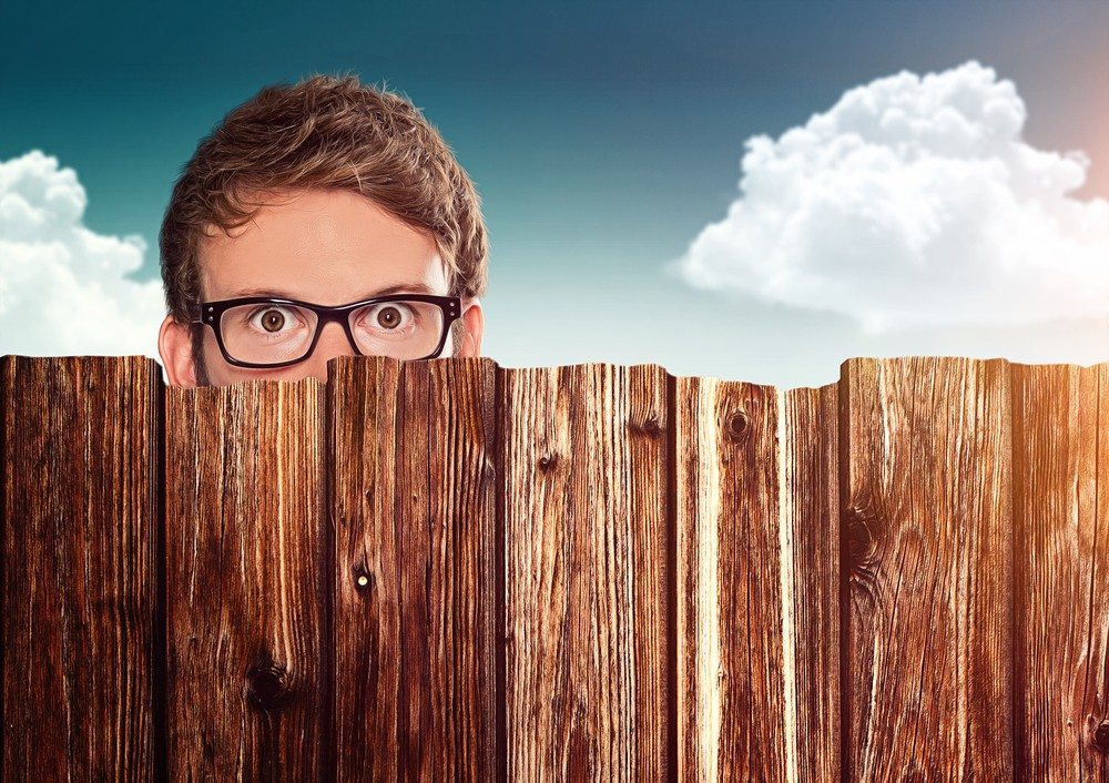 Nosy neighbor image via Shutterstock