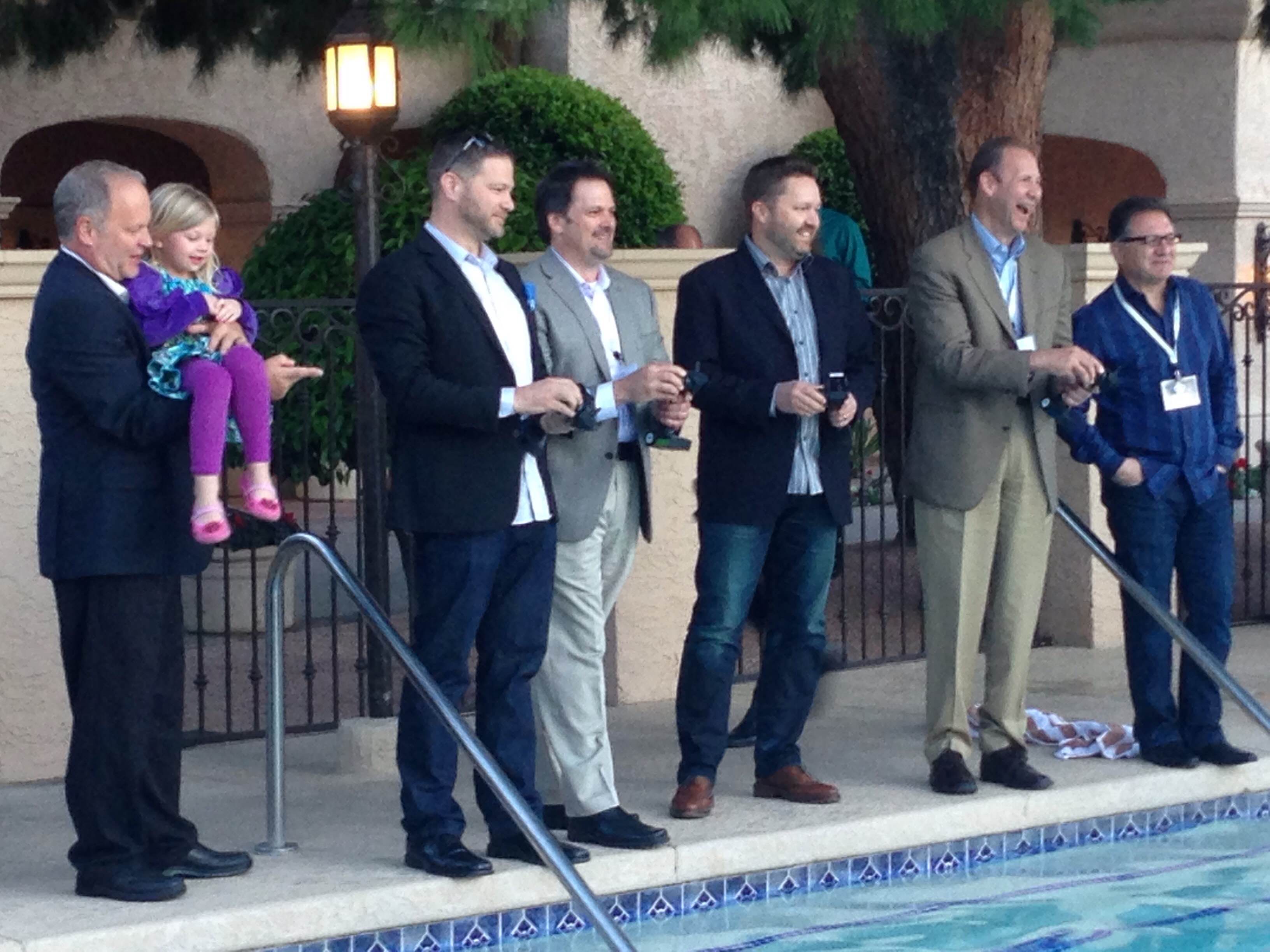 Zillow's Steve Allen, Trulia's John Whitney, Homes.com's Andy Woolley and Move's Russ Cofano compete in a boat race.