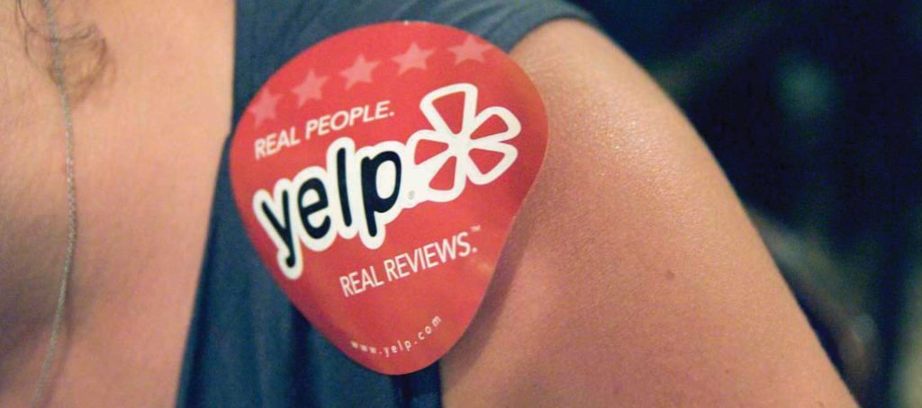 Broker in court seeking identity of Yelp reviewer