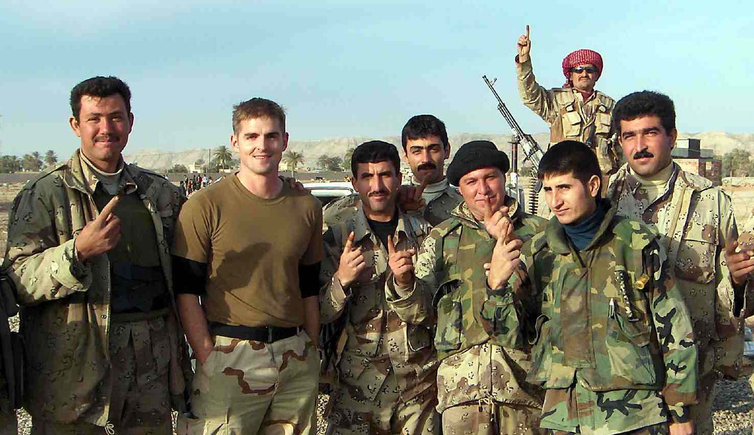 Tommy Sowers (second from left) in Iraq. Photo credit: Panosian32 via Wikimedia Commons.