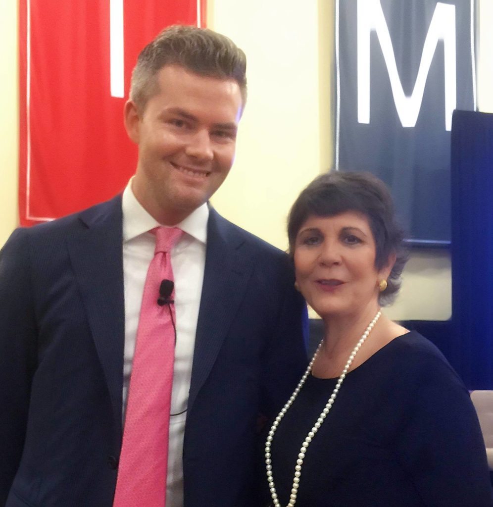 Ryan Serhant poses with Katherine Salvio, a real estate agent at NextStopNY, at a panel on real estate data hosted by StreetEasy. Credit: Katherine Salvio