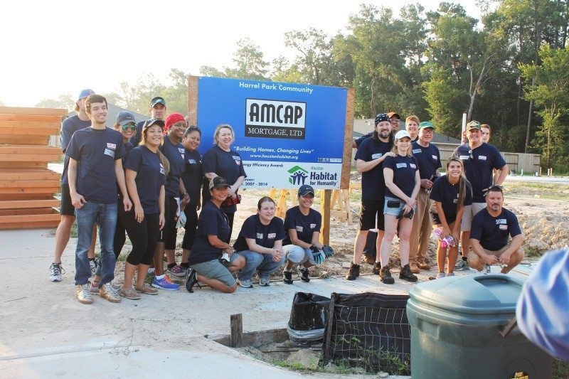 Working with Habitat for Humanity, helping to build a home for a Houston resident