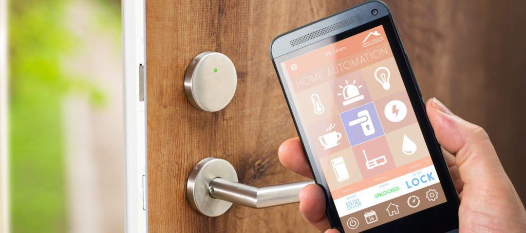 A phone with smart home technology unlocking the door.