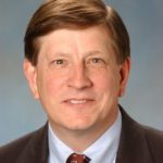 A headshot of Dave Metzger, the retiring CFO/COO of Re/Max