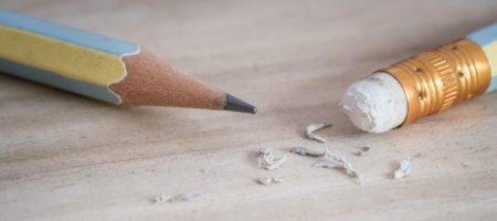 A photo of a pencil and eraser