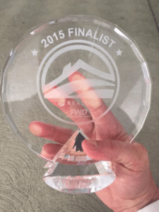 A photo of the Realogy FWD trophy that SoloPro displays in its office.