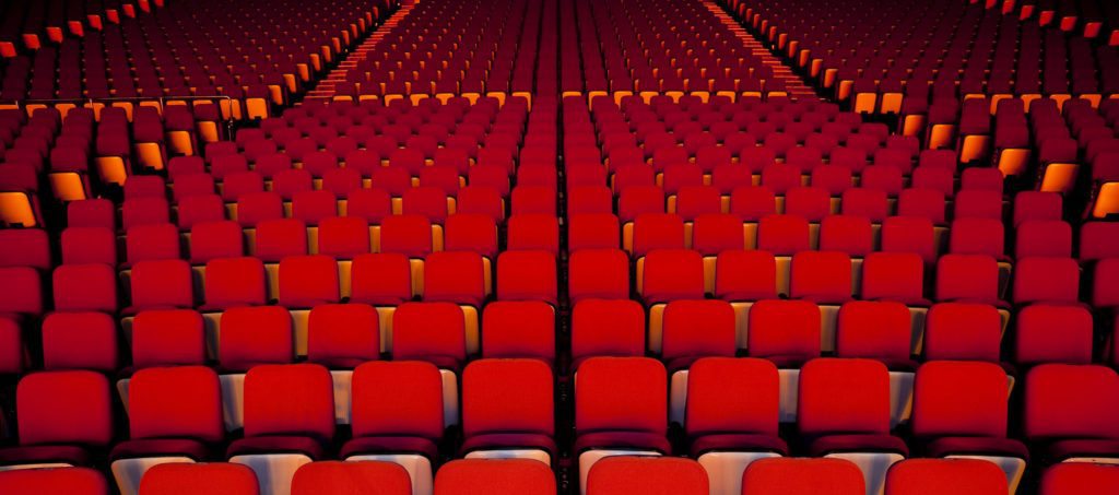 Empty seats in a theater.