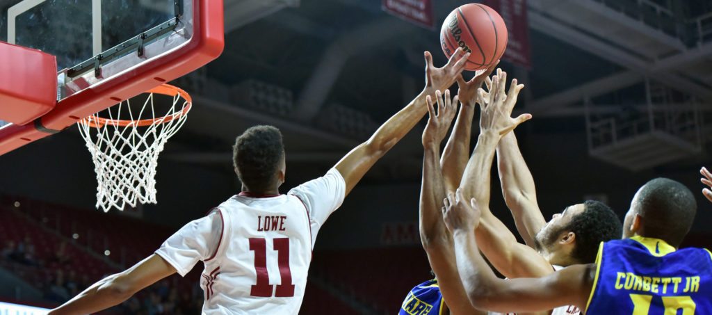 Temple Owls guard Trey Lowe (11) tries to grab a rebound during a NCAA basketball game November 29, 2015 in Philadelphia.