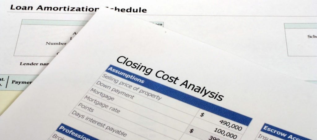 A closeup of closing cost documents