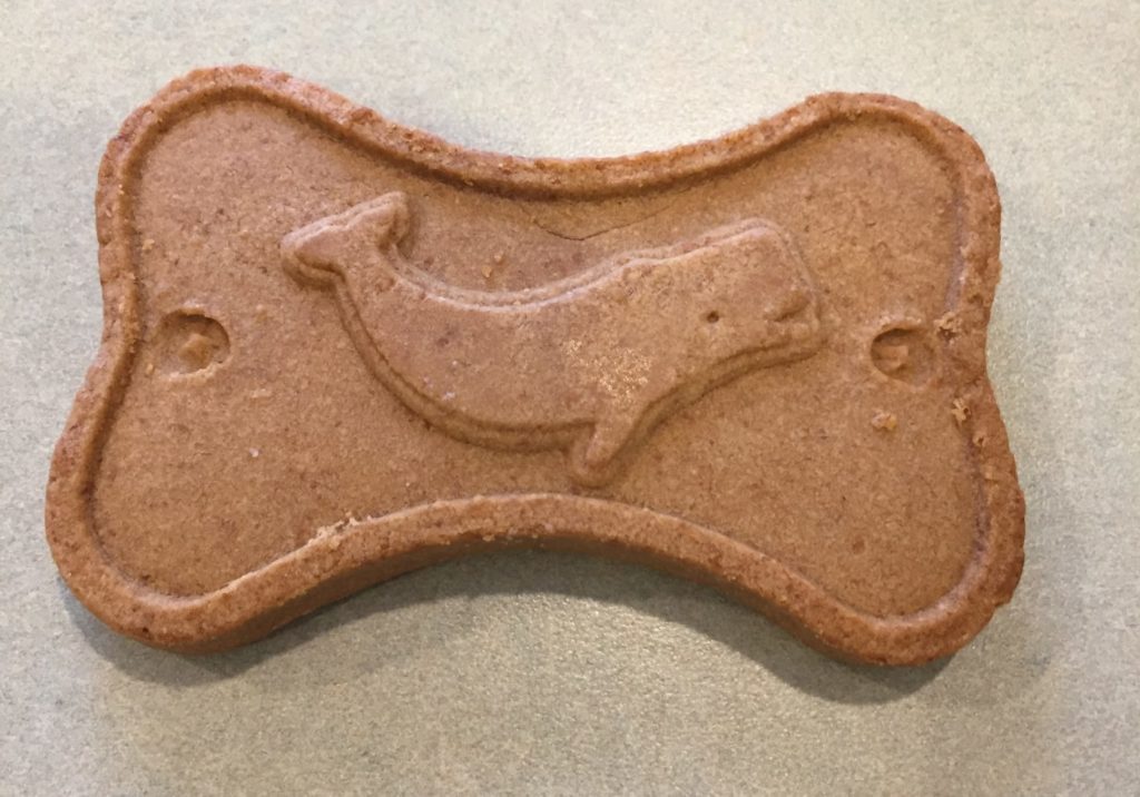 The whale of a dog biscuit that Tina McGowan gives to clients.