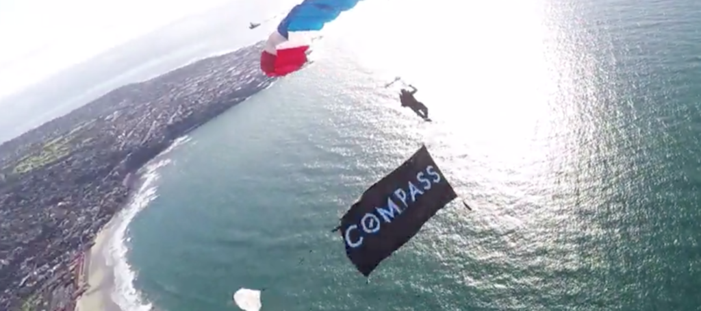 A Realtor skydived straight into a Compass anniversary party