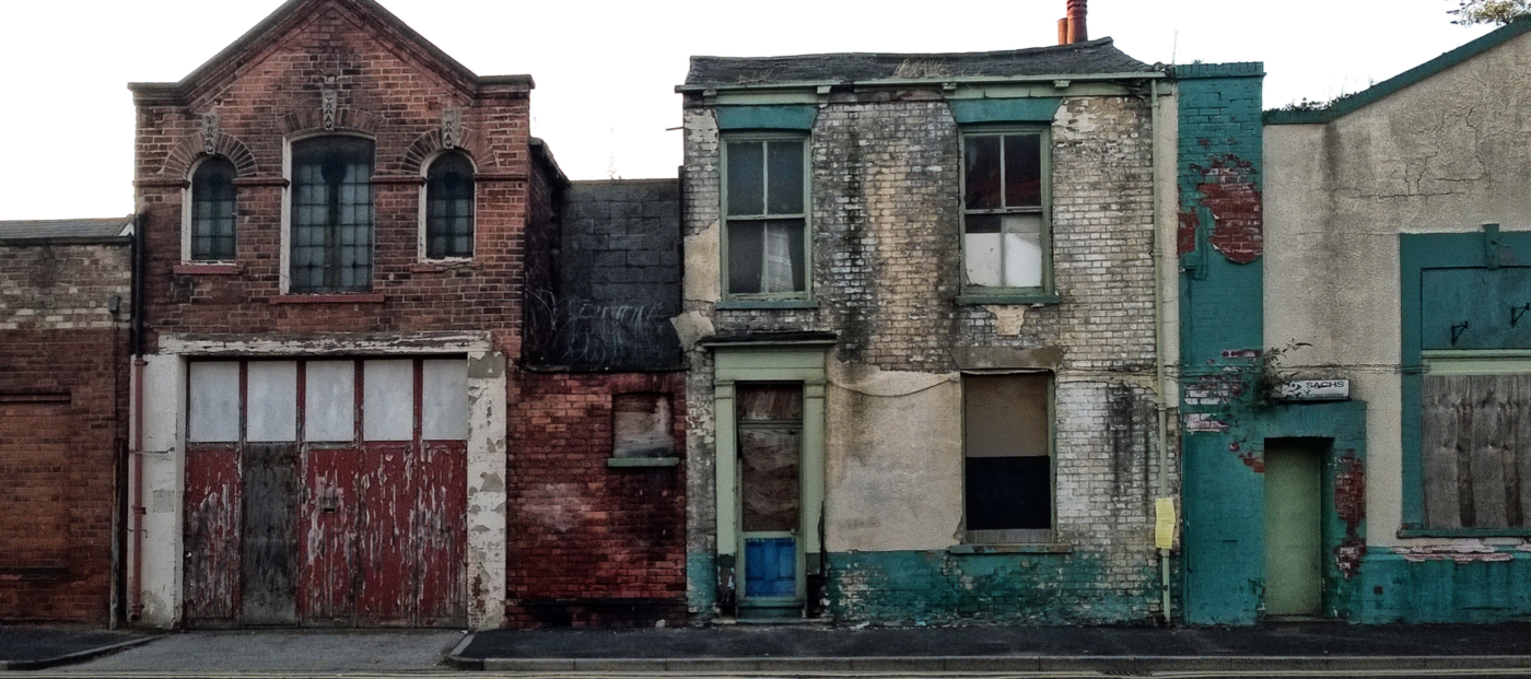 Home prices in opportunity zones continue to fall behind