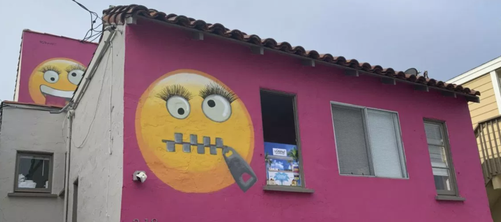 Pink emoji house that caused neighborhood furor up for sale